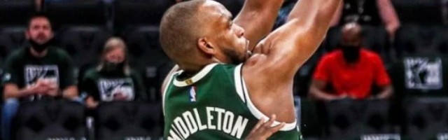  巴特勒三双热火加时险胜尼克斯  